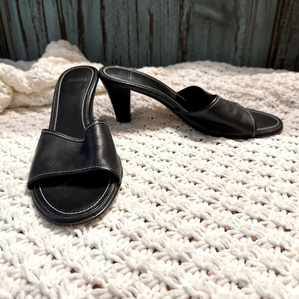 Black leather Coach heels